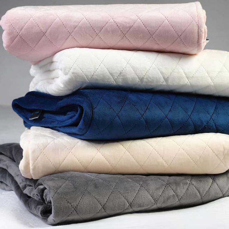 Weighted blankets by Australian company Neptune blankets range in price between $99 and $235. Picture: Instagram/Neptune blankets