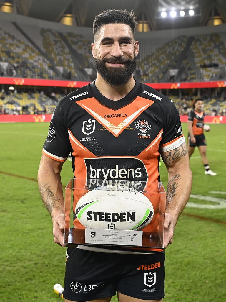 James Tamou poses with the match ball after playing his 300th NRL game in round 19 of 2022. Picture: Ian Hitchcock/Getty Images