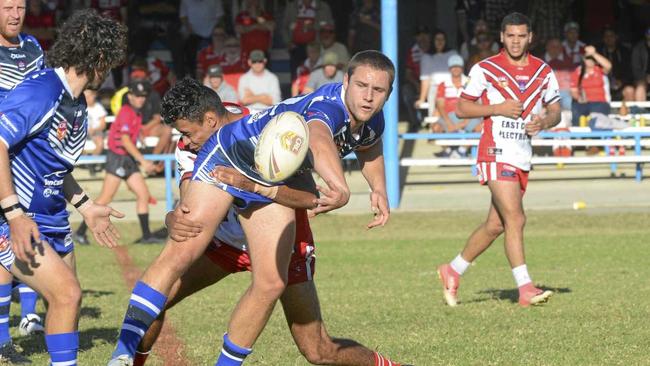 Ghosts second-rower Matt Muller offloads the ball out to Jaske Frame during the Battle of the River Group 2 local derby between Grafton Ghosts and South Grafton Rebels at Frank McGuren Field. Picture: Matthew Elkerton