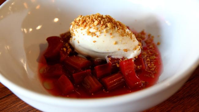 Apple ice cream joined by poached rhubarb in a rose-spiked syrup ($15).