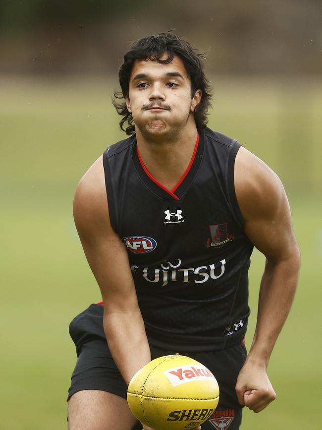 Jayden Davey shoots off a handball. Picture: Getty Images