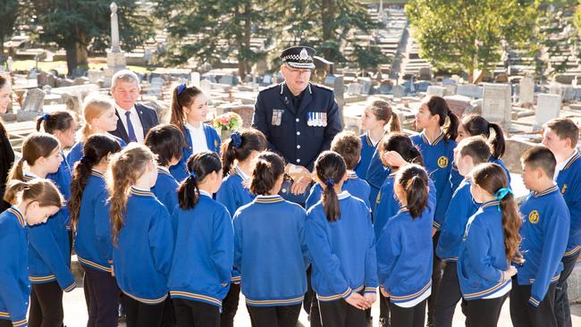 Burwood Primary School students singing during the ceremony at Burwood Cemetery.