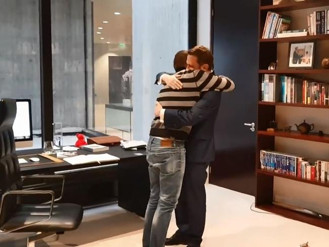 Brendan Berne and Thomas Marti embrace after the proposal. Picture: Facebook