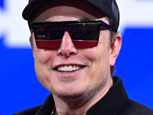 TOPSHOT - Elon Musk speaks during the annual Conservative Political Action Conference (CPAC) at the Gaylord National Resort & Convention Center at National Harbor in Oxon Hill, Maryland, on February 20, 2025. (Photo by SAUL LOEB / AFP)