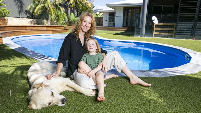 Rosie Zieba, with Roman, 3, and Aura the golden retriever at their Perth home, which they sold after a strong year for the city’s property market. Picture: Ross Swanborough