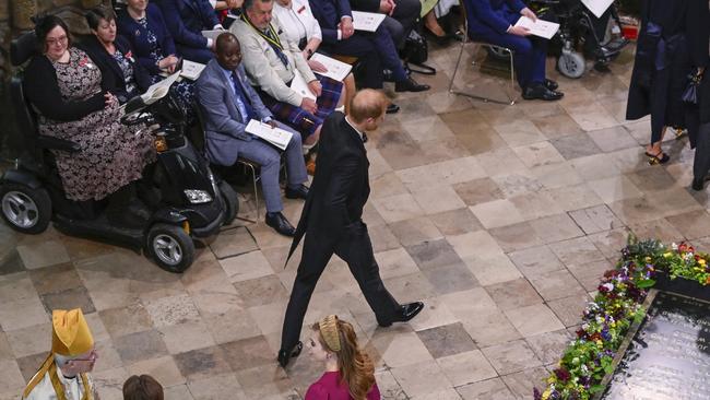 A poignant photo captured Prince Harry as a lonely figure on his father’s big day. Picture: Gareth Cattermole/Getty Images