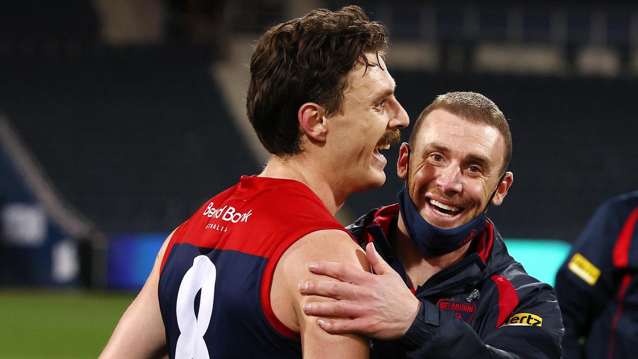 Melbourne coach Simon Goodwin (right) will be looking to find a way for Jake Lever to recapture his best form. Picture: Michael Klein