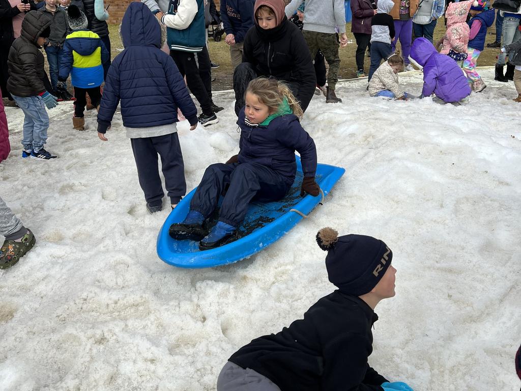 Emmerson ready to slide through the snow field at Snowflakes in Stanthorpe on Saturday, July 1 2023. Photo: Jessica Klein