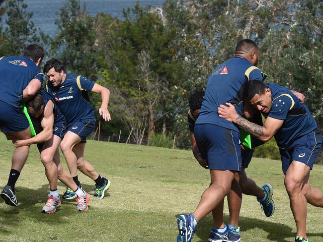 Wallabies perform uphill clean-out drills.