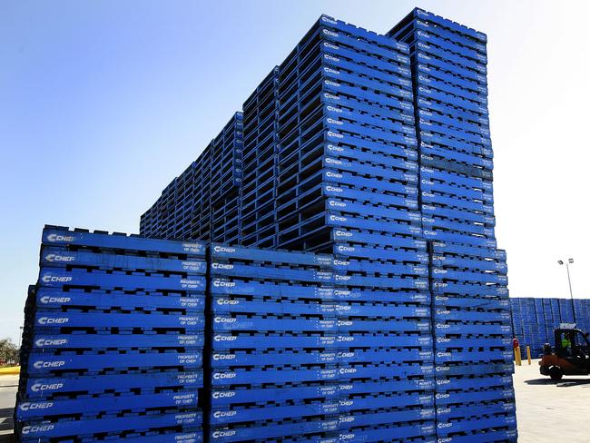 Brambles Ltd.'s CHEP pallets are stacked at CHEP's Dandenong South Service Centre outside Melbourne, Australia, on Monday, Aug. 17, 2009. Brambles Ltd., the world's biggest supplier of pallets used to move and store goods in factories, will announce full-year earnings on Aug. 20, 2009. Photographer: Luis Enrique Ascui/Bloomberg