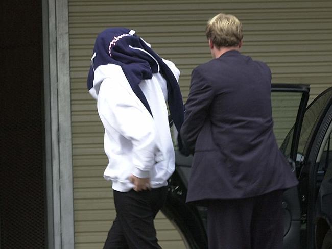 Belinda Van Krevel is led into court in 2001 to face charges relating to the murder of her father.