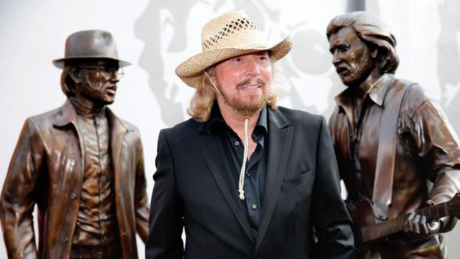 Barry Gibb will officially open stage two of Bee Gees Way today at Redcliffe. Barry Gibb at the new statue in Bee Gees way