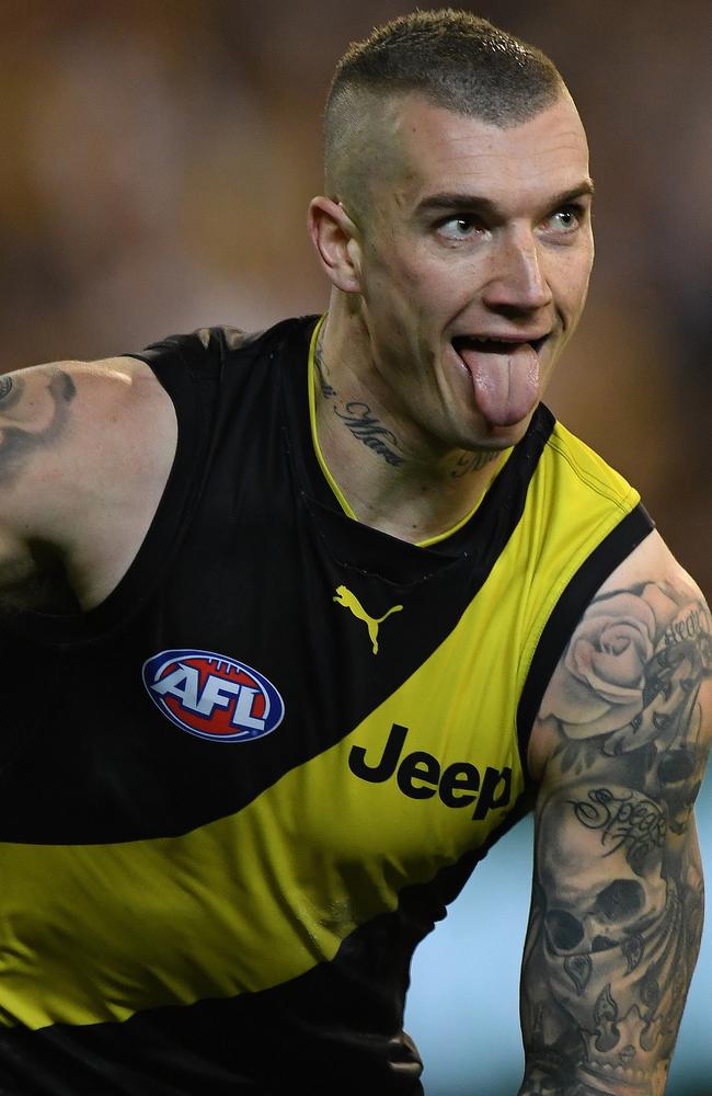 Dusty Martin pokes his tongue out after kicking a goal in the first minute of the final quarter. Picture: AAP/Julian Smith