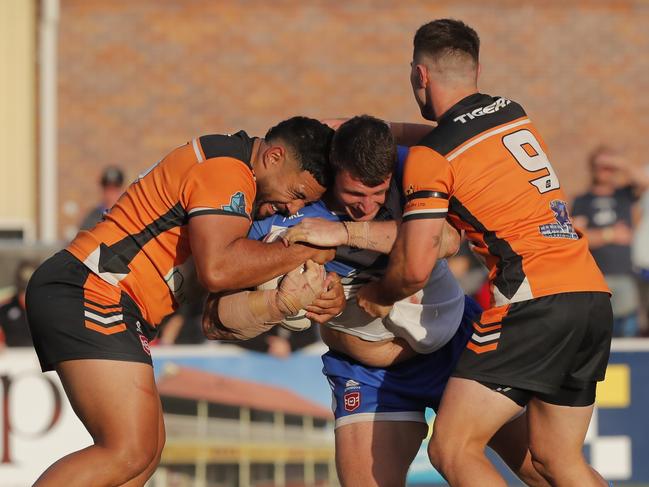 Sione Katoa of Southport Tigers lays a tackle. Photo: Regi Varghese