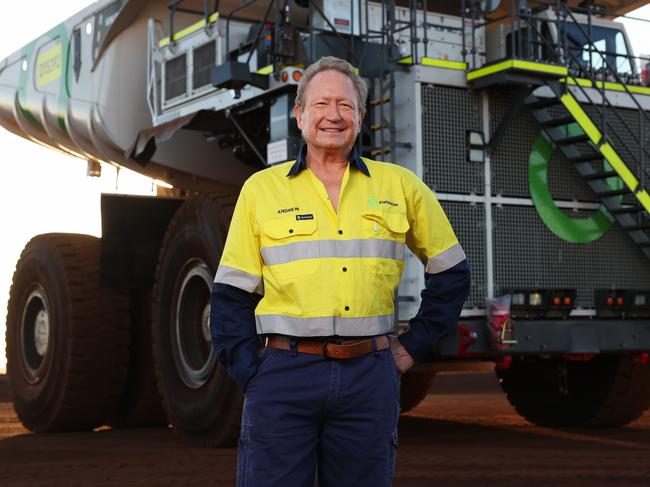 ON HOLD : Embargoed for The Daily telegraph. 15.8.2024 Dr Andrew Forrest stands in front of a new green energy haul truck.  The Christmas Creek mine is an iron ore mine located in the Pilbara region of Western Australia, 61 km south-south-west of Nullagine. Picture: Rohan Kelly