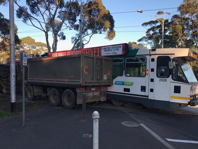 The truck and tram came to grief at a road crossing near the Melbourne Zoo.