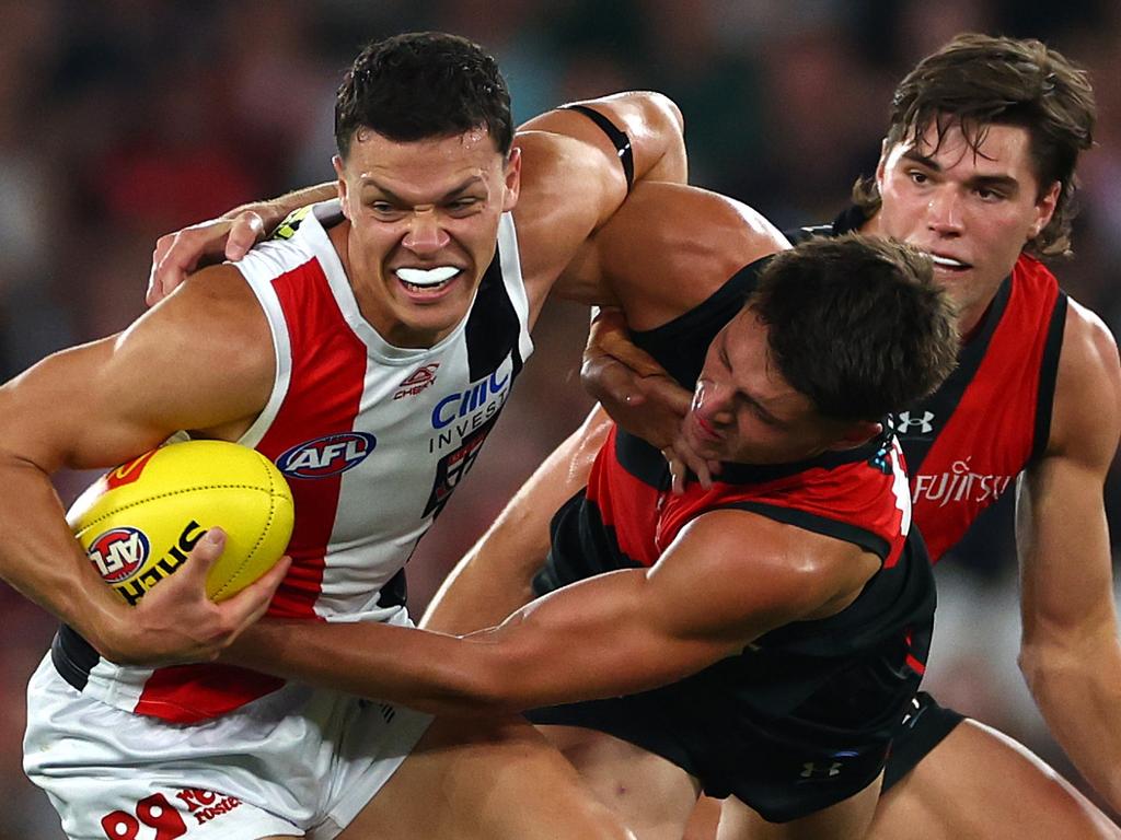 Marcus Windhager being tackled by Archie Perkins. The Saint will miss Gather Round after being suspended for a bump on Sam Durham. Picture: Quinn Rooney/Getty Images.