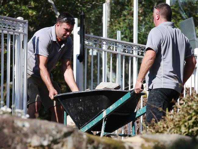 12/09/2018: Bricks are removed from and area near the pool at the Dawson home in Bayview. In 2015, detectives from the Homicide SquadÕs Unsolved Homicide Unit established Strike Force Scriven to re-investigate the circumstances surrounding the 1982 disappearance and suspected murder of Northern Beaches wife and mother, Lynette Joy Dawson. As part of their ongoing commitment to providing answers to her family, Strike Force Scriven detectives have commenced a forensic search at Mrs DawsonÕs former home at Bayview today (Monday 10 September 2018). Hollie Adams/The Australian