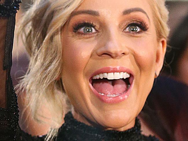 MELBOURNE, AUSTRALIA - MAY 08: Carrie Bickmore waves as she arrives at the 58th Annual Logie Awards at Crown Palladium on May 8, 2016 in Melbourne, Australia. (Photo by Scott Barbour/Getty Images)