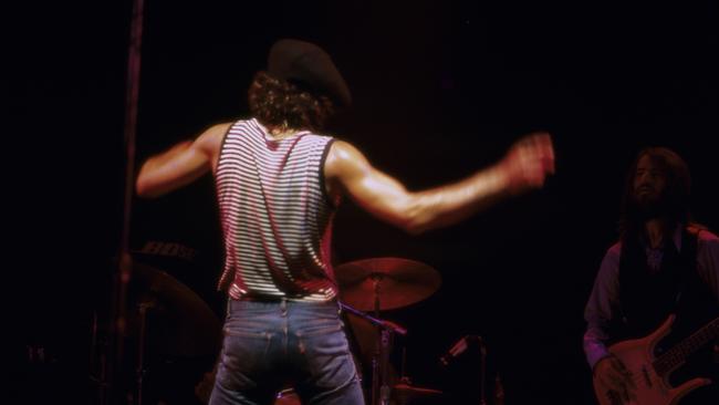 Bruce Springsteen performs with The E-Street Band at Alex Cooley's Electric Ballroom on August 22, 1975 in Atlanta, Georgia.