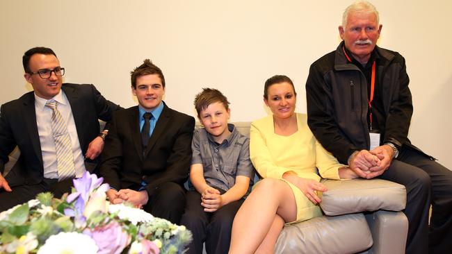 Jacqui Lambie with her sons Brentyn and Dylan Milverton, her nephew Jet Lambie and her father Tom after delivering her maiden speech.