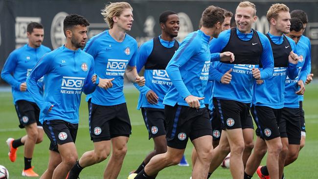 Melbourne City defender Ritchie De Laet leads the way at training in preparation for their elimination final against Adelaide United tomorrow. Picture: AAP