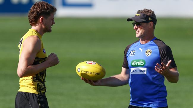 Jacob Hopper chats with Tigers coach Damien Hardwick. Picture: Michael Klein