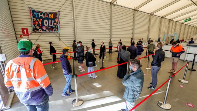 People have been queuing up to get the vaccine at the Melbourne Showgrounds site in Flemington. Picture: Tim Carrafa