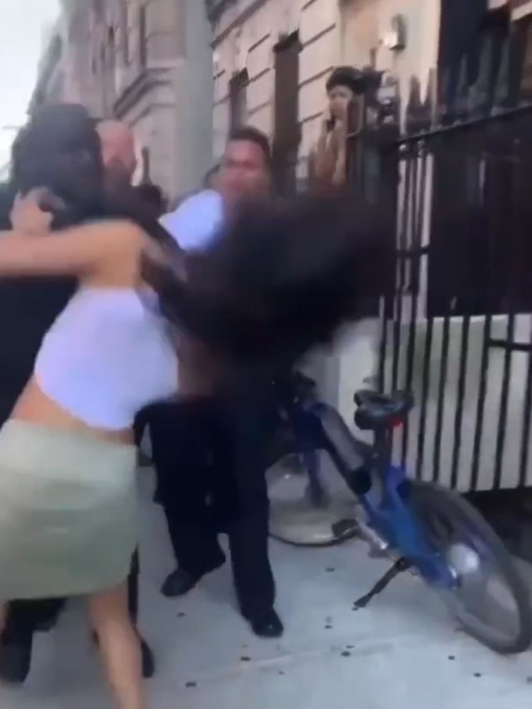 The police officer punched her hard in the face. Picture: Twitter / @etanthomas36