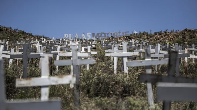 Crosses are planted on a hillside at the White Cross Monument near Langebaan, South Africa, each one marking a white farmer who has been killed in a farm murder, (Pic: Gulshan Khan/AAP)