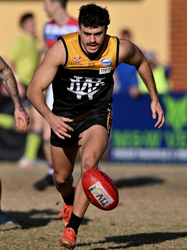 WRFL: Danny Grmusa hunts the ball for Werribee Districts. Picture: Andy Brownbill