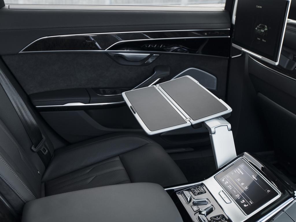 Optional fold-out tables and screens in the rear of the A8 ensure a suite ride.