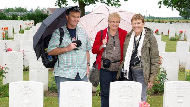 Siblings Craig Fletcher, Maureen Rosich, centre, and Diane Farrell on their pilgrimage to visit the grave of their great uncle Alexander Russell Robert Page.