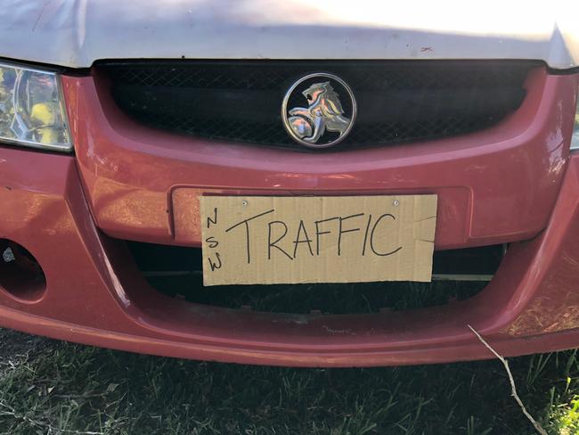 The front end of a Holden Commodore abandoned in Quirk Rd, Manly Vale, after an alleged police pursuit. Picture: Jim O'Rourke