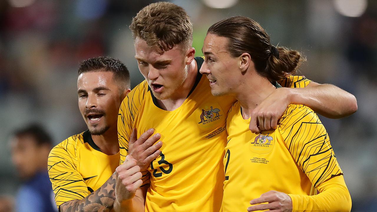 Souttar celebrates a Socceroo’s goal on his debut appearance.