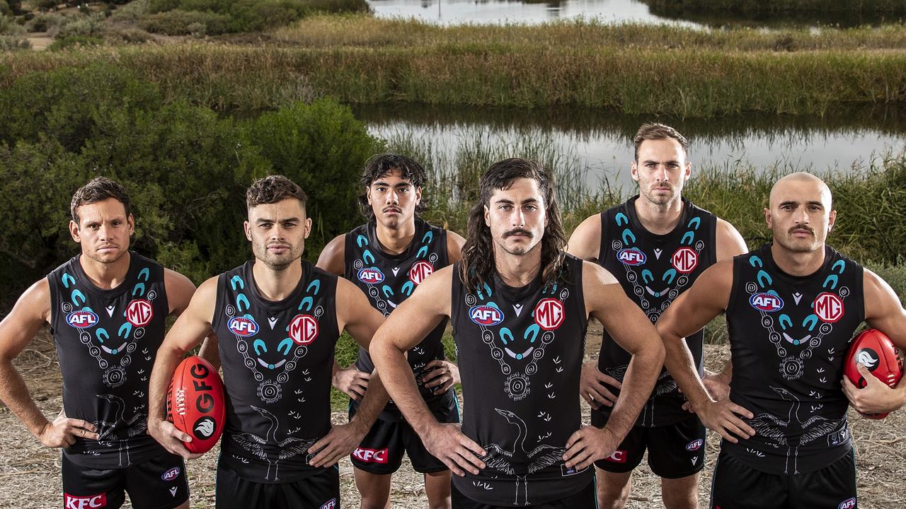 Amon with Port Adelaide’s indigenous playing cohort. They reached out to their Crows counterparts after the Taylor Walker racism saga. (Photo by Sarah Reed/AFL Photos/via Getty Images)