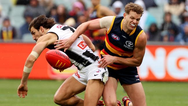 Mitch Hinge clashes with Josh Daicos last round.