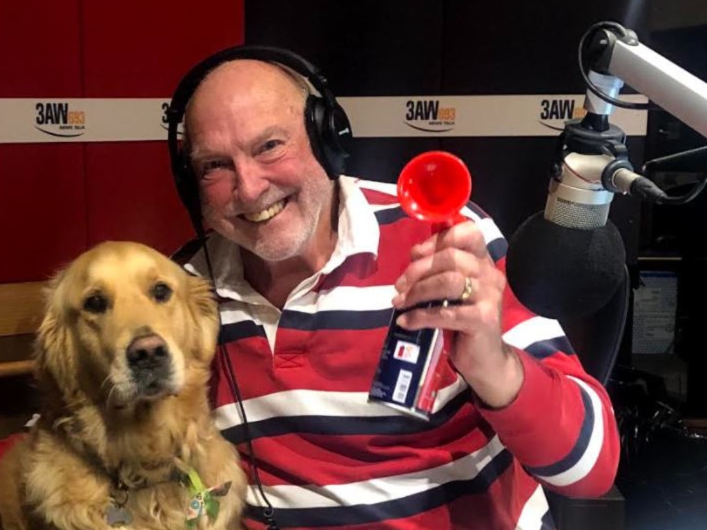 Rex Hunt in the 3AW studio with his golden retriever, Jack.