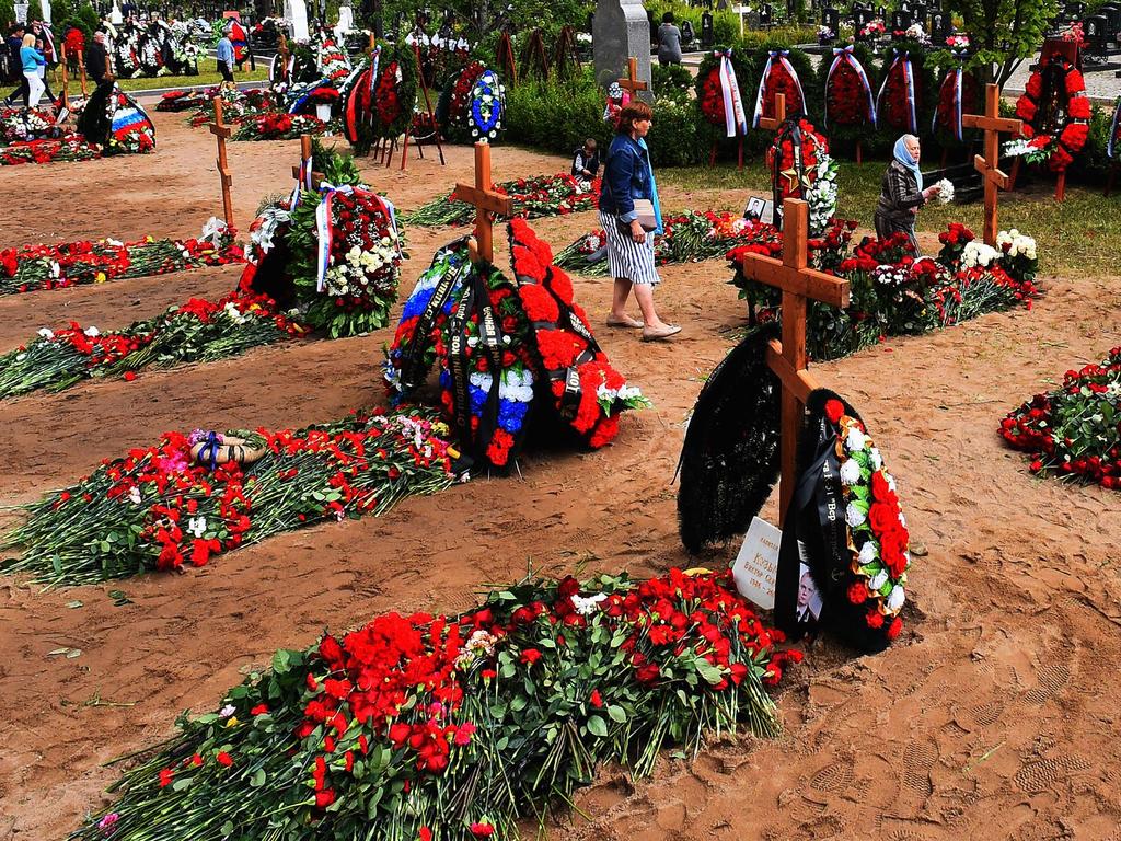 The funeral of the 14 officers killed in the disaster. Picture: Olga Maltseva / AFP