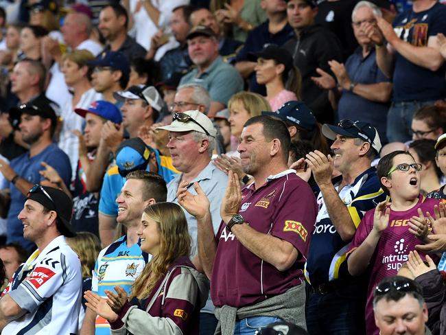 Fans applaude Johnathan Thurston of the Cowboys at the 7 minute mark of the game during the Round 25 NRL match between the Gold Coast Titans and the North Queensland Cowboys at Cbus Super Stadium on the Gold Coast, Saturday, September 1, 2018. (AAP Image/Dave Hunt) NO ARCHIVING, EDITORIAL USE ONLY