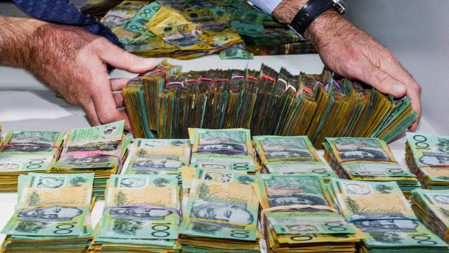 $1.8 million cash seized during Operation Ironside South Australian arrests. Picture: Brenton Edwards