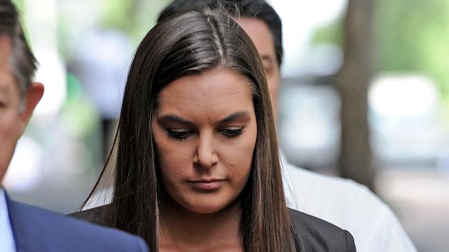 Kim Duthie, the "St Kilda School girl", attends a Victorian Supreme Court hearing of a submission on a book by former AFL player and agent Ricky Nixon, that potentially defames the notorious "St Kilda School girl", in Melbourne, on Tuesday, Nov. 24, 2015. (AAP Image/Joe Castro) NO ARCHIVING