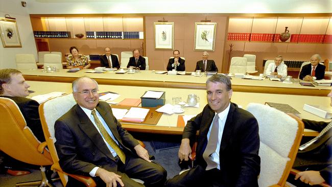 Then treasurer Peter Costello, with prime minister John Howard and deputy prime minister John Anderson during a break in a Cabinet meeting in 2001.