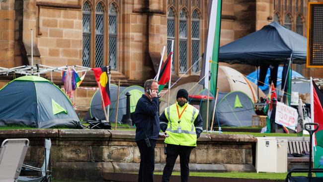 Security have moved in on a pro-Palestine encampment at the University of Sydney after protesters were told to vacate by university staff. Picture: NewsWire / Max Mason-Hubers