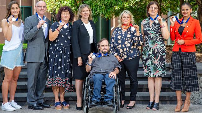 Hannah Keane, Matt Cronin, Robyn Cronin, Penny Fowler, Chris Hall, Shusannah Morris, Caterina Politi and Preeti Daga with their Pride of Australia medals. Picture: Mark Stewart