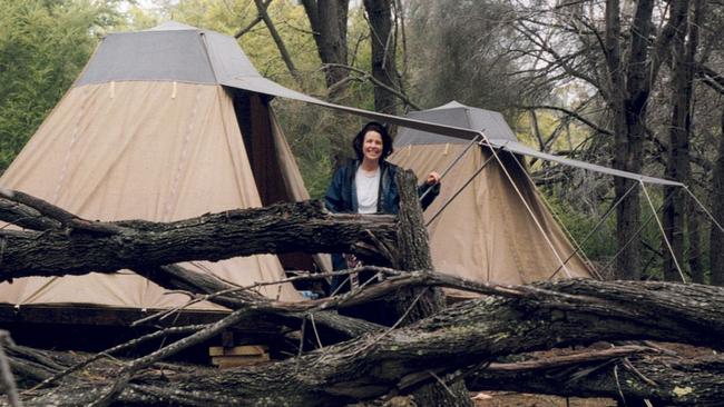 Joan Masterman at the now defunct Cooks Beach standing camp during the early days of the Freycinet Experience Walk. The company is seeking to reinstate the camps. Picture: File