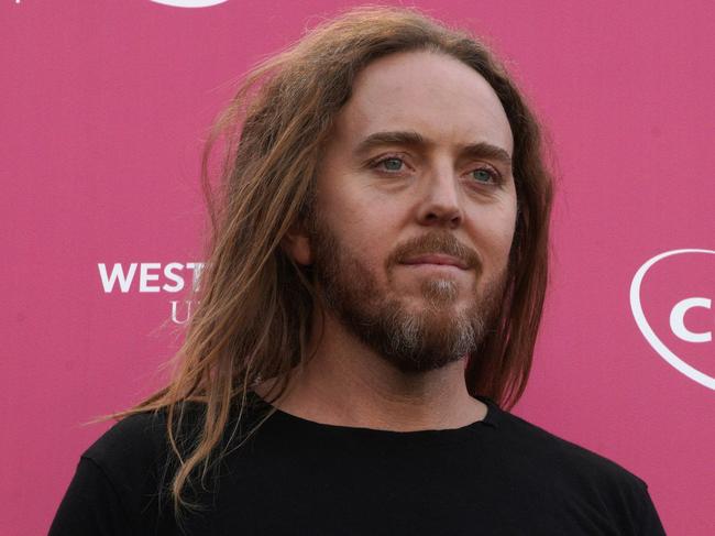 Tim Minchin poses for a photograph on the black carpet ahead of the 2018 Tropfest festival in Sydney, Saturday, February 17, 2018. (AAP Image/Ben Rushton) NO ARCHIVING