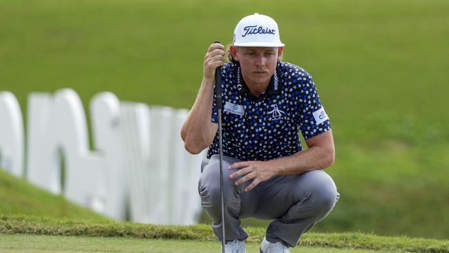 DORAL, FL - OCTOBER 30: Team Captain Cameron Smith of Punch GC lines up a putt on the fourth green during the team championship stroke-play round of the LIV Golf Invitational - Miami at Trump National Doral Miami on October 30, 2022 in Doral, Florida.   Eric Espada/Getty Images/AFP