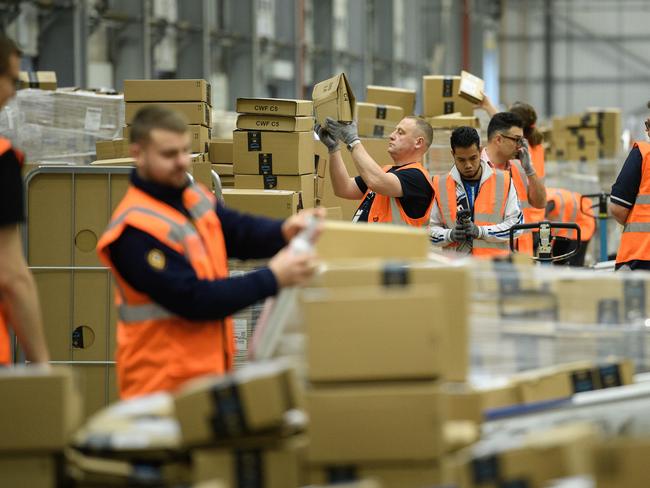 Workers in a UK Amazon warehouse.