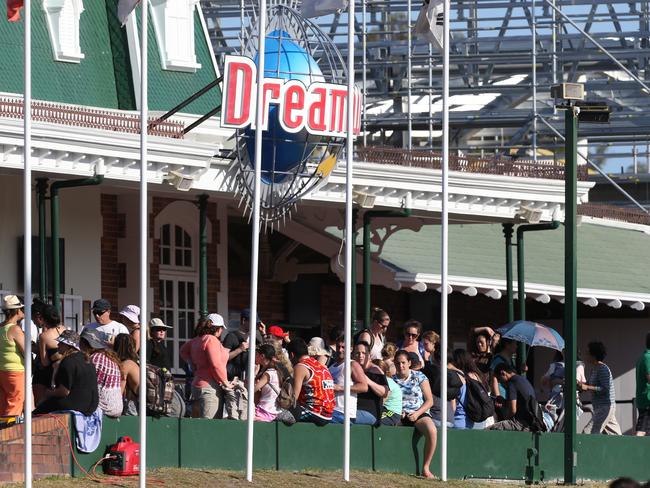 Park goers poured out of the Dreamworld front gates after the incident. Photo: Regi Varghese